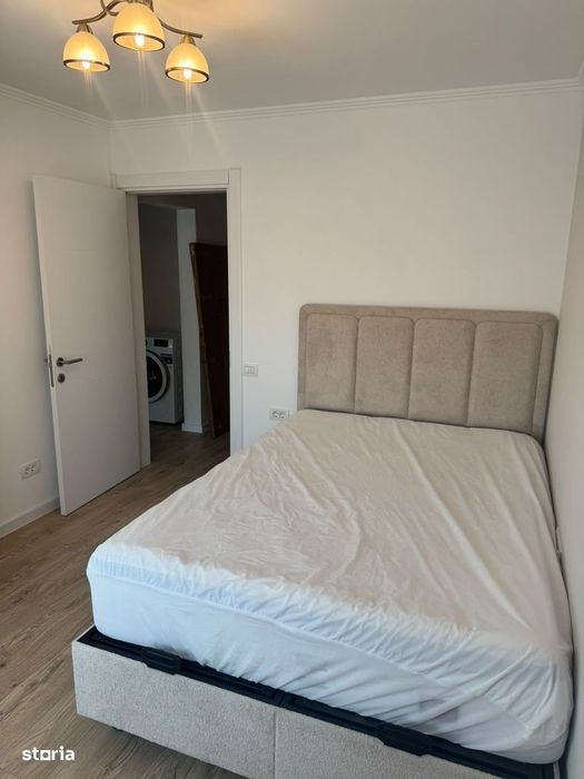 Inchiriere 3 camere, cu loc de parcare, totul nou