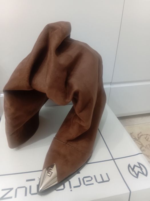 Продаются сапоги новые