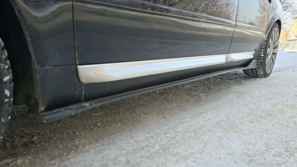 Audi A6C5 Элероны на пороги