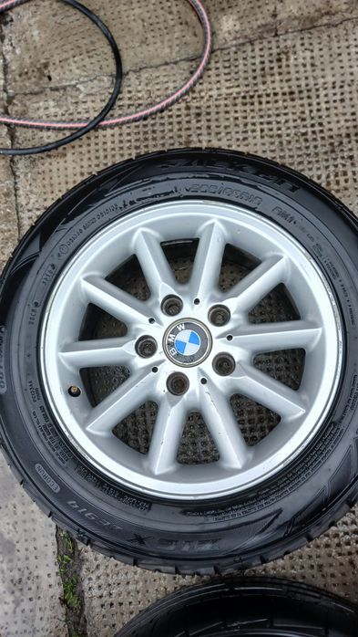 Cauciucuri  cu tot cu jante pt bmw,205/60 R 15 OFERTA"200 lei 4 buc cu tot cu jante
