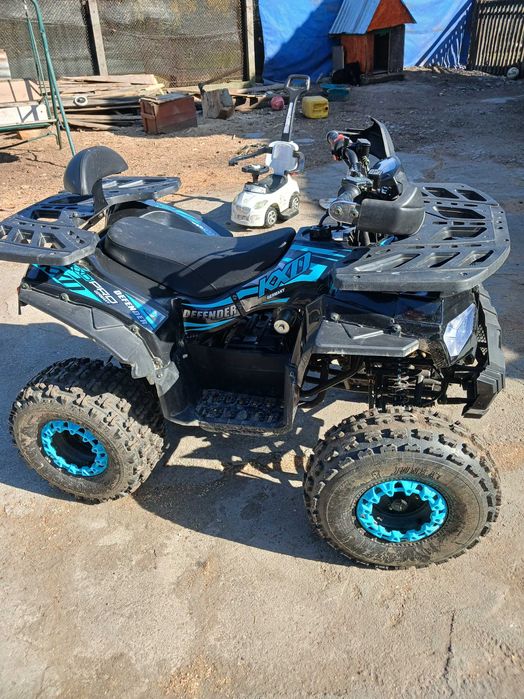 Atv kxd 125 model defender