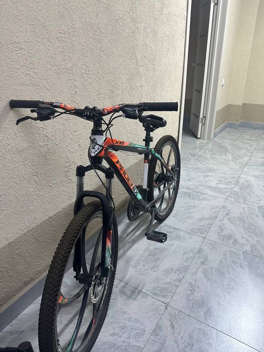 Продам велосипед феникс Х6, нужно закрутить руль и сидение