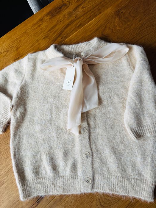 Жилетка с вълна и панделка