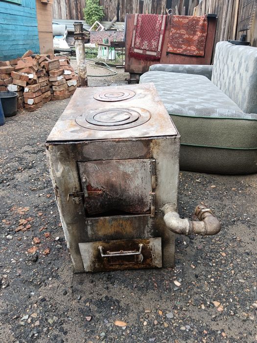 Продам печь б/у на твёрдом топливе