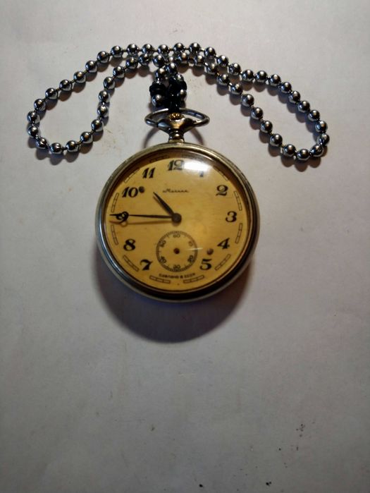 Съветски джобен механичен часовник.
