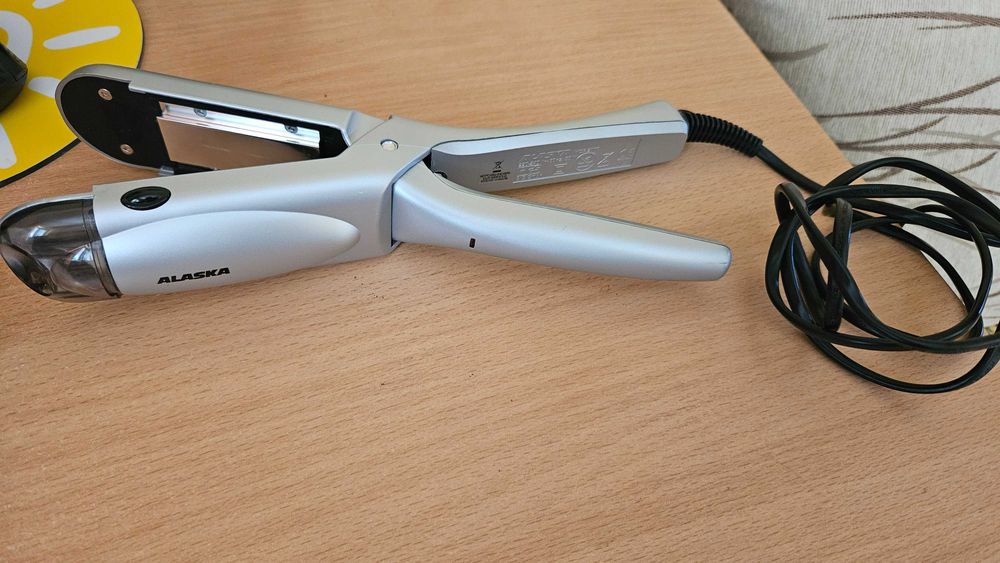 Преса за коса с функция "Пара"