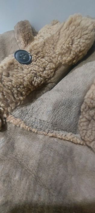 Жилеты цигейковые