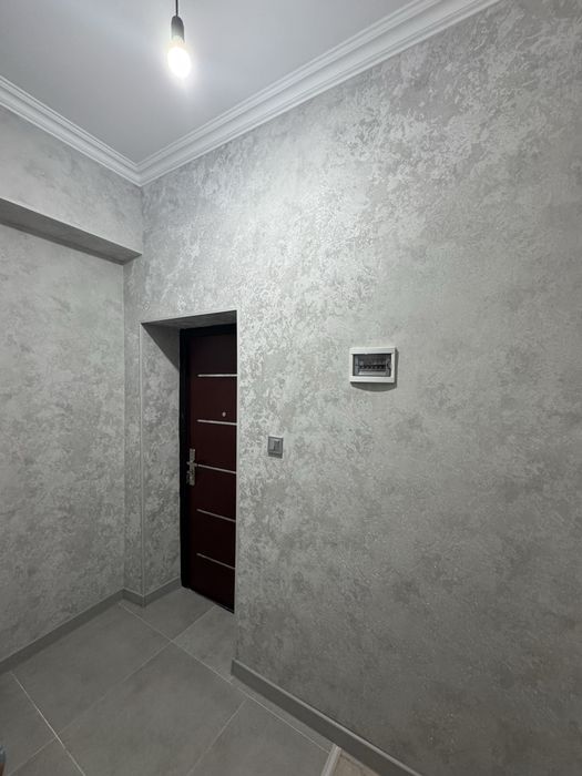 Бирхоналик ва икки хоналик бирта килинган общий площад 107 кв метр