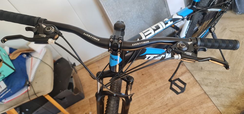 Bicicletă Tiger cadru aluminiu tare impecabilă roți pe 29 frână disc față spate impecabilă