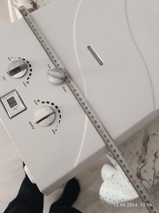 Газовый водонагреватель