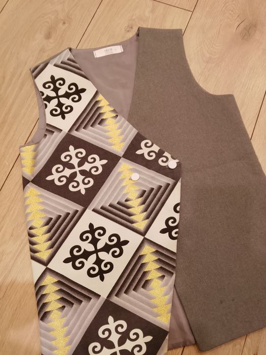 Жилетка в школу серая