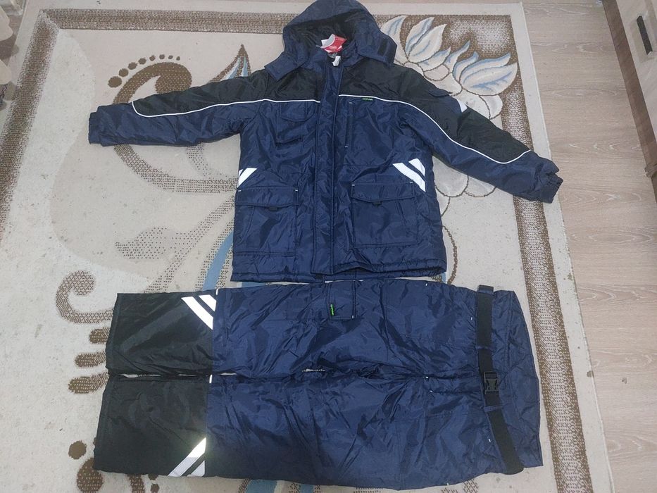 Зимний комбинезон новый