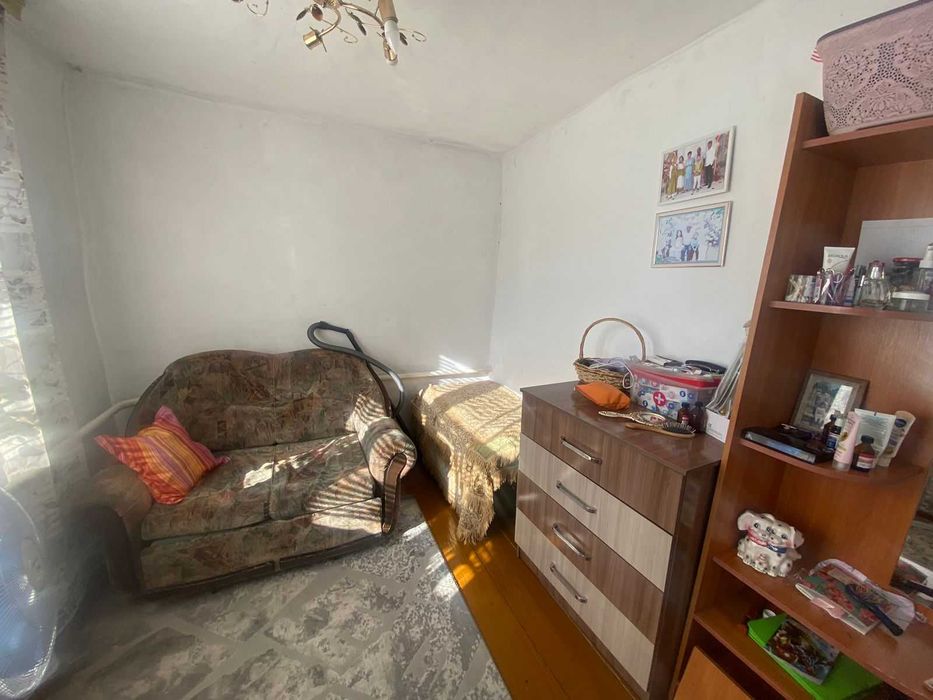 Дом на Бугре, Танат Империя