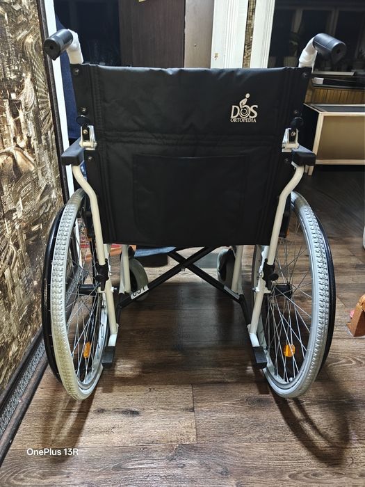 Инвалидная коляска