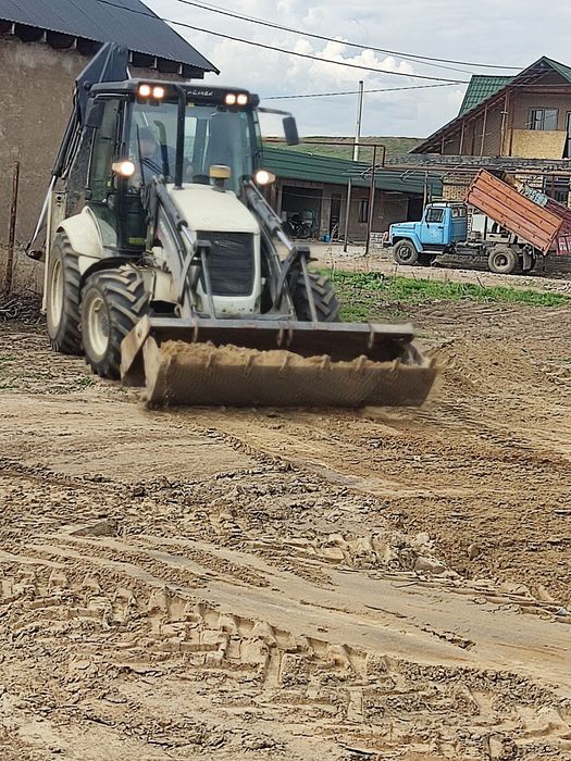 Аренда Экскаватор погрузчик 3в1 трактор