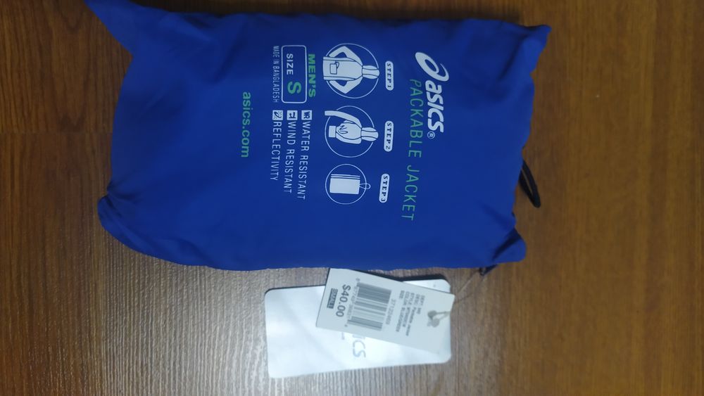 Две куртки ветровки новые,