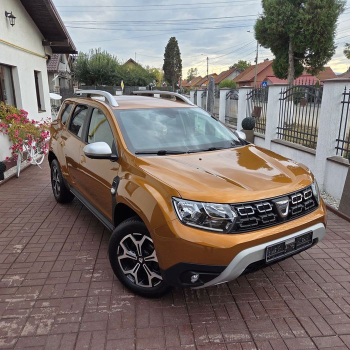 Dacia Duster 4x4 1.2 benzina 125CP Turbo~Impecabil~Prestige Orange~jante/Navi/Camera/carte service