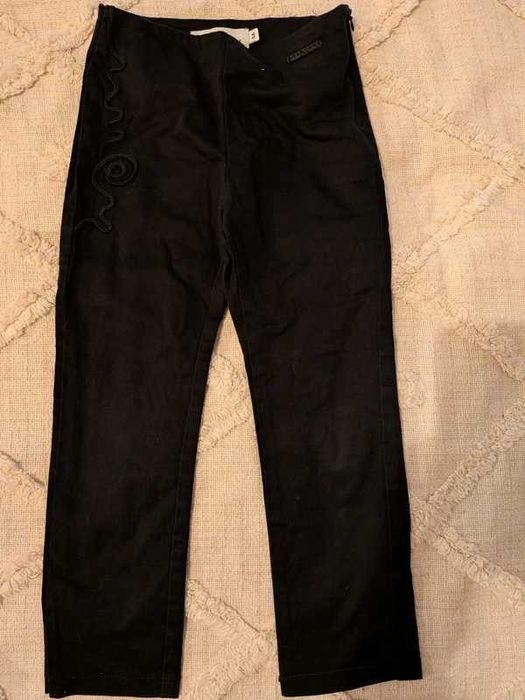 Pantaloni negrii, cu fermoar lateral, în stare foarte bună  104 110