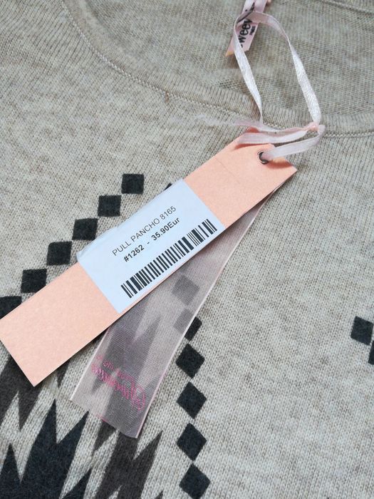 Ново цветно пончо