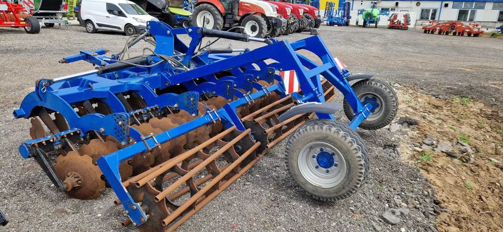 Disc agricol polonez 5 metri semitractat, rabatabil hidraulic, cu tăvălug