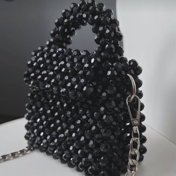 Toshdan toʻqilgan sumkalar