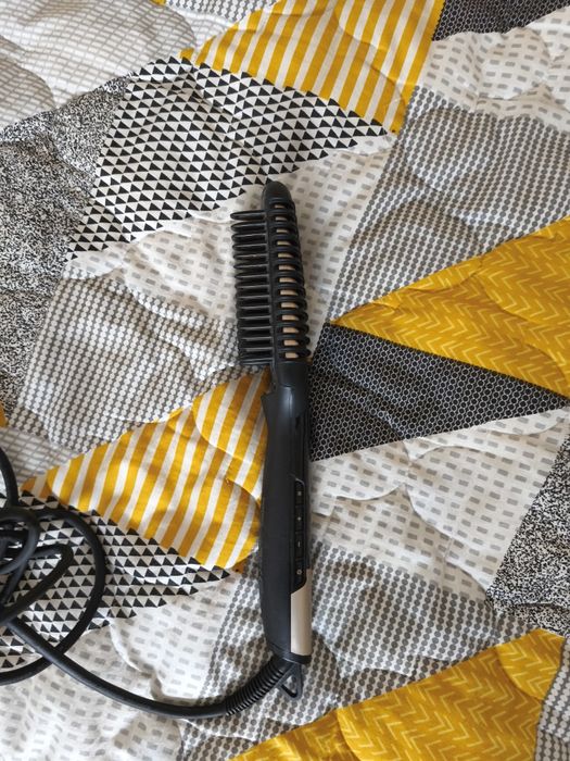 Изправяща четка за коса