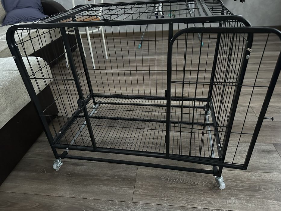 Продам клетку для щенков.