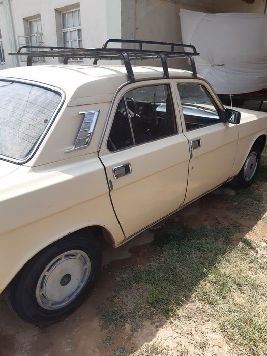 Gaz 2410,yili 1989,rangi qymoq rang sariq,mator va karobka ochilmagan,