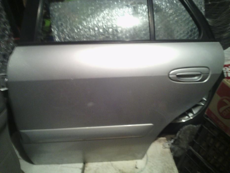 Задна врата,бобина Mazda 626-GF 99-2001 г.