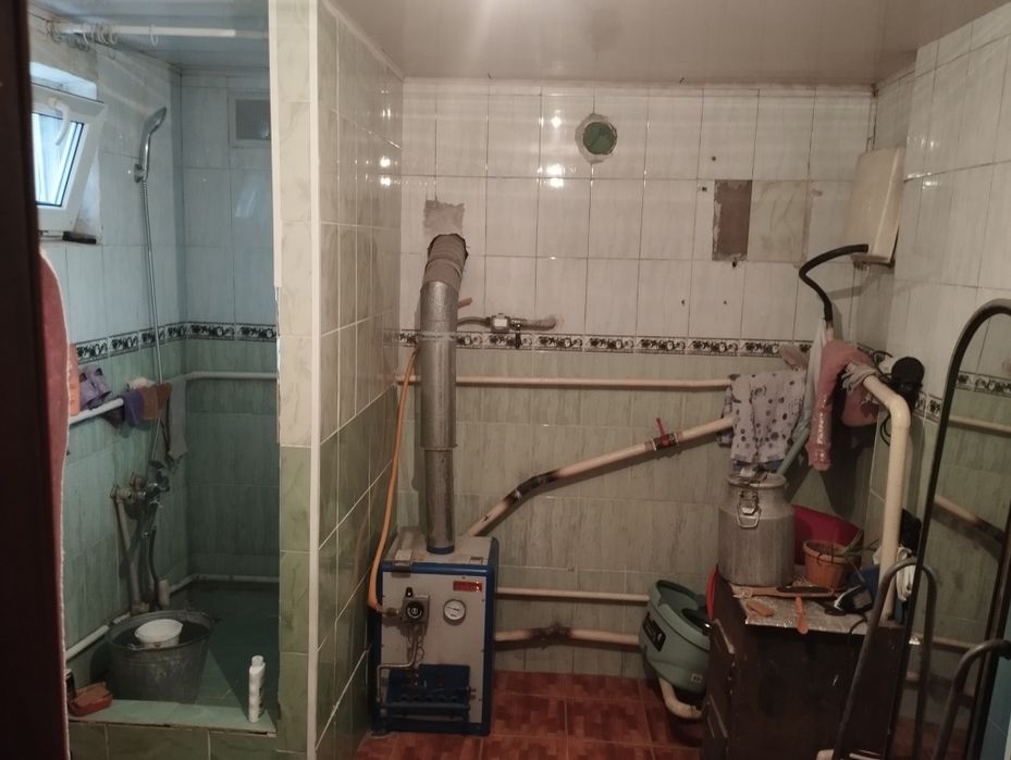 Продам дом в центре Ащибулака