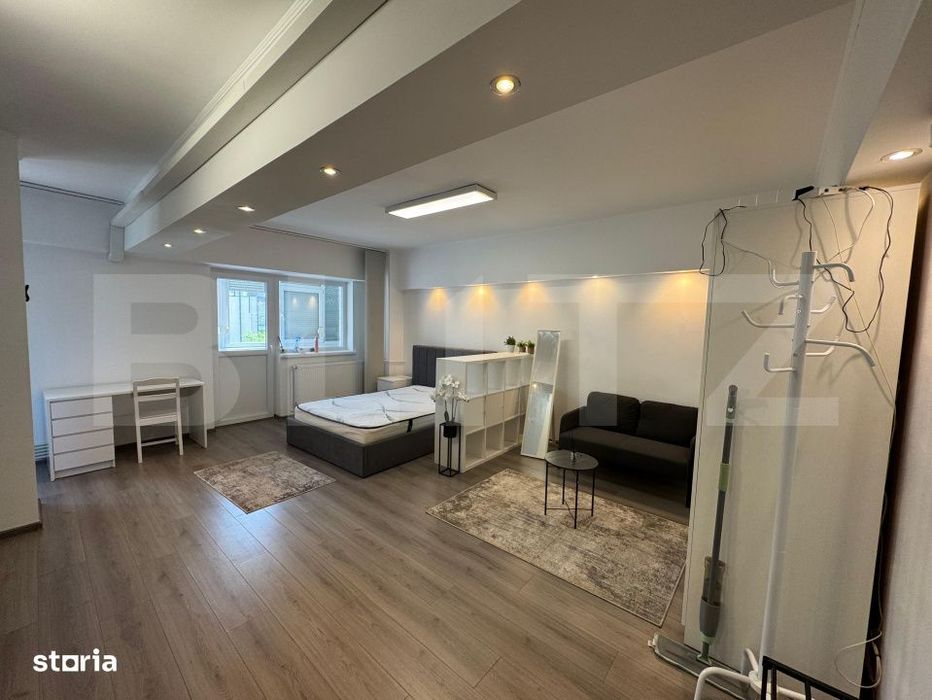 Garsoniera de inchiriat, 38 mp, open space, centrala proprie, Calea Bu