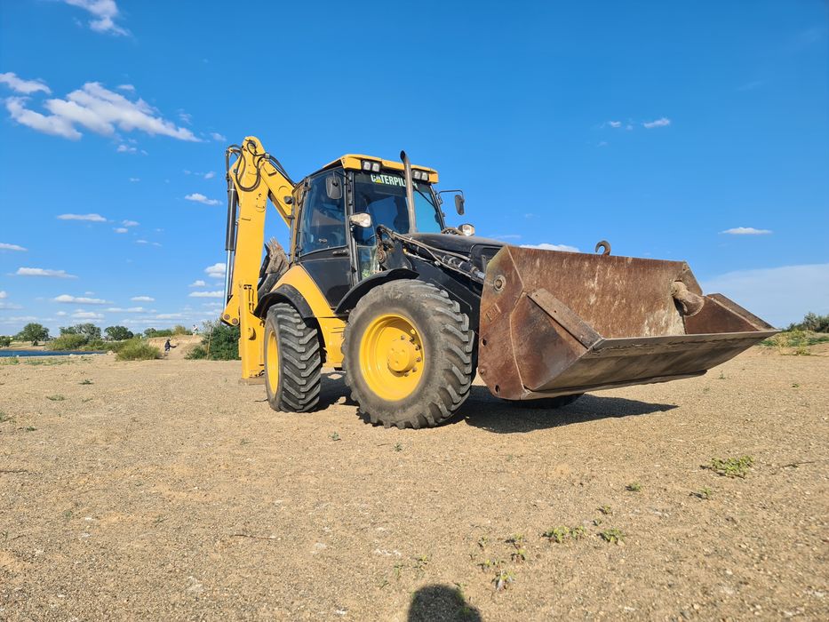 Экскаватор- погрузчик