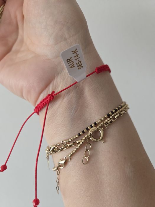 Bratara cu bile de aur