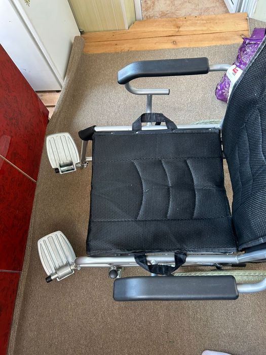 Инвалидная коляска