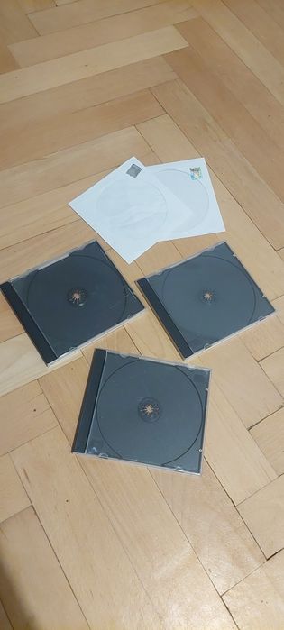 2 albume de CD-uri in stare excelenta plus cadou