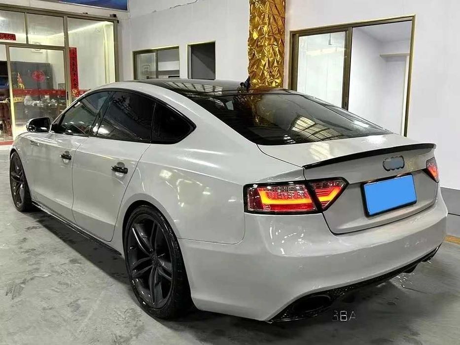 Eleron Portbagaj Lip Codita Audi A5 B8 Sportback (09-16), Negru Lucios