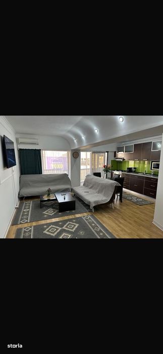 De închiriat apartament 2 camere ultracentral, loc de parcare inclus .