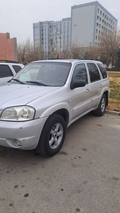 Мазда трибют 2,3