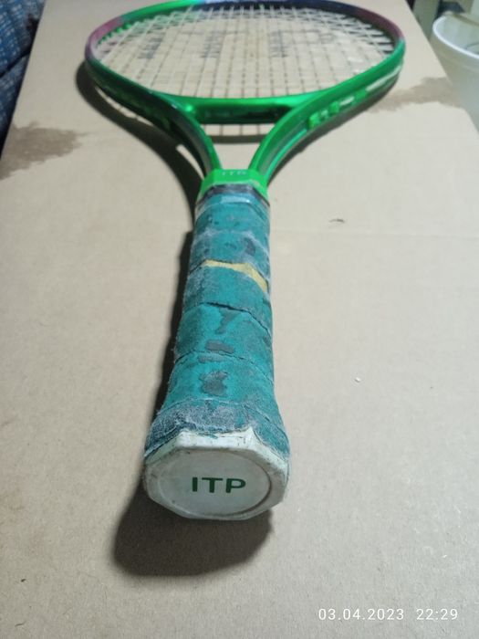 Тэнисная ракетка