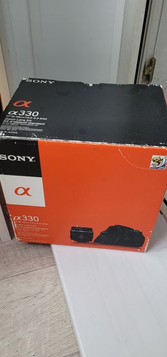 Sony Alpha DSLR-A330 с объективом.