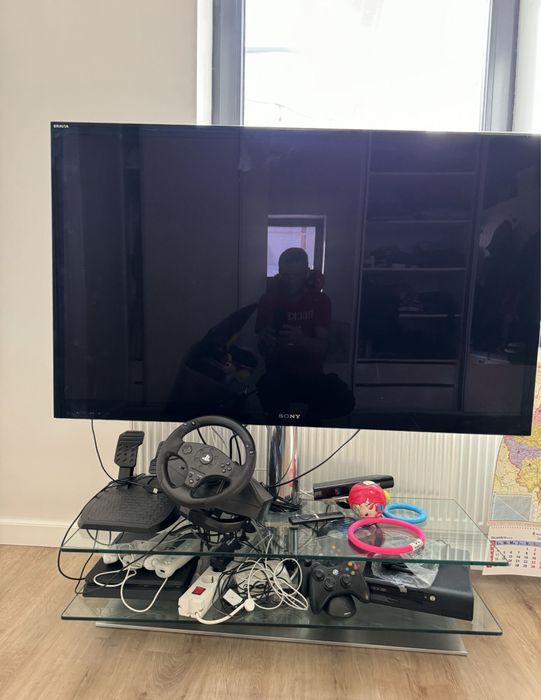 masa rotativa suport tv din inox si sticla si stick smart xiaomi