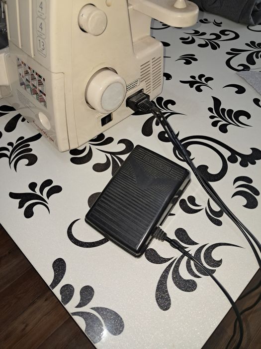 Каверлок. Merrylock, 5000