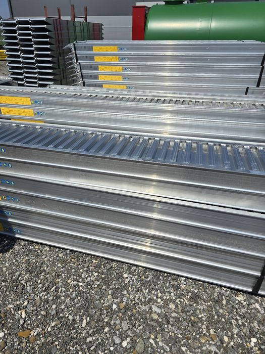 Алуминиеви рампи ,пътеки и вериги за багери