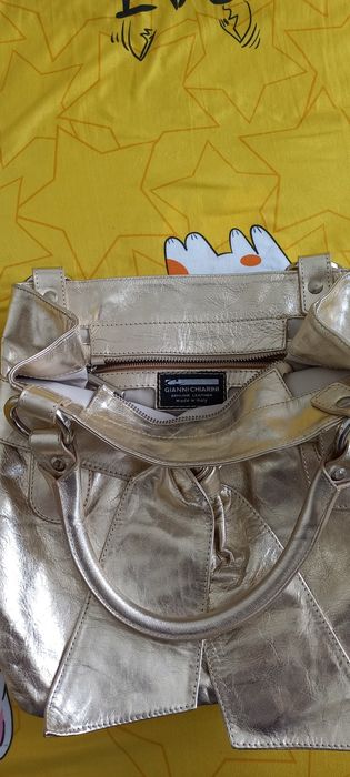 Vând geanta  piele naturala  auriu