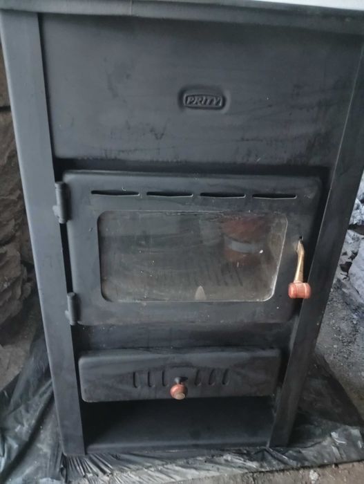 Комплект за локално парно-камина Prity 14 KW(водна риза 10 KW),два радиатора,помпа Wilo и UPS.
