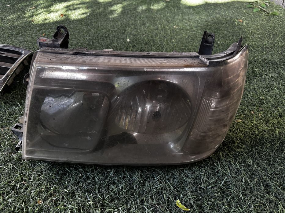 Land cruser 100 решотка, фары левые