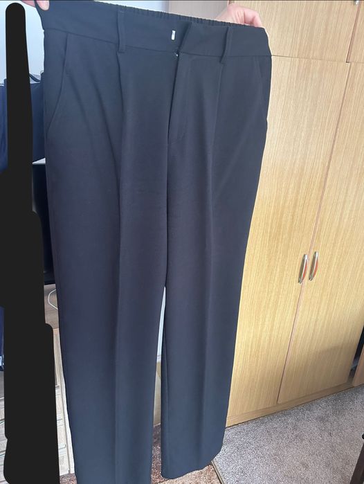 Pantaloni dama     .