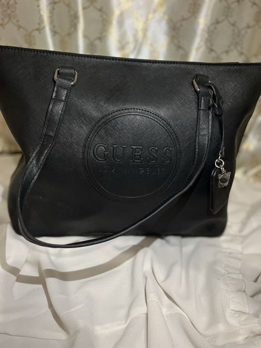 Geanta nouo de culuare neagra medie spatioasa ati ancap multe an ea