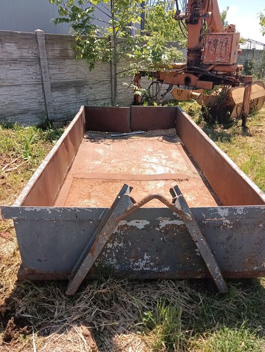 Container abrolkiper
