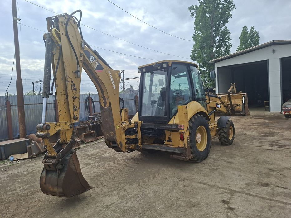 Vand buldoexcator CAT 428E